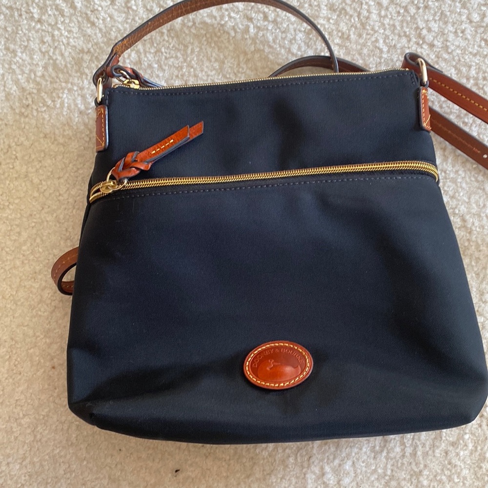 Dooney & Bourke black cross body purse. Almost brand new